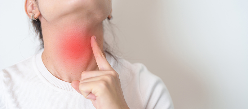 A patient experiencing discomfort due to thyroid nodules