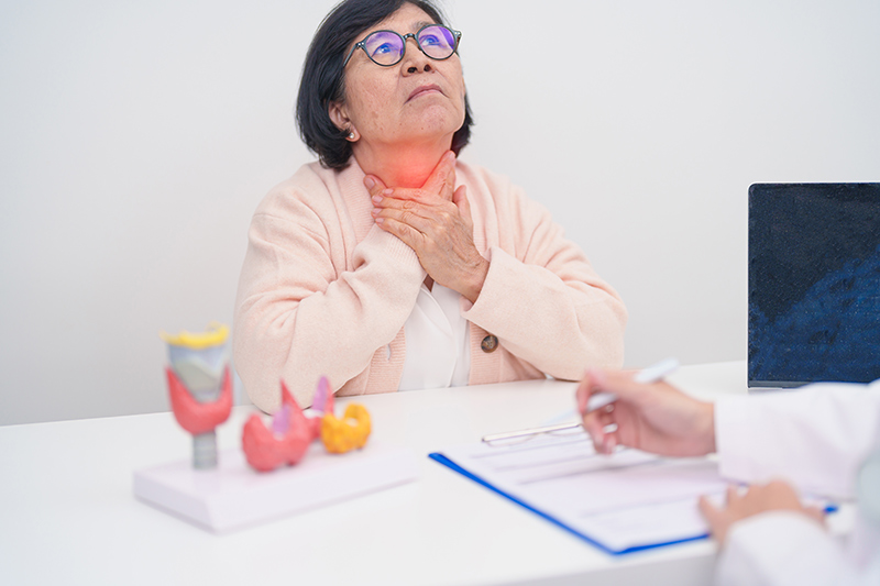 A patient visiting a thyroid specialist due to neck pain